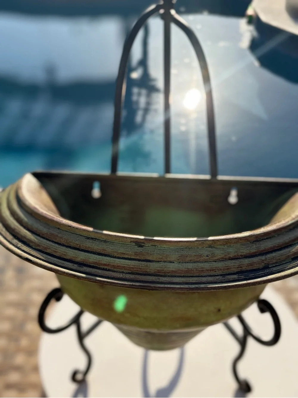 Green Ceramic Hanging Planter with Black Metal Stand